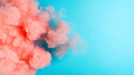 Fototapeta premium vibrant cloud of pink smoke swirls against bright blue background, creating dynamic and colorful abstract scene. contrast between colors adds sense of movement and energy