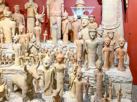 Nicosia, Cyprus, October 15, 2024: The Cyprus Museum, the main place hiding the history of the island. Interior - presentation of pottery vessels and figurines. Nicosia, Cyprus