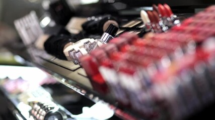 Various  cosmetic products of a modern cosmetics store close-up. Concept of cosmetic products, discounts and shopping.