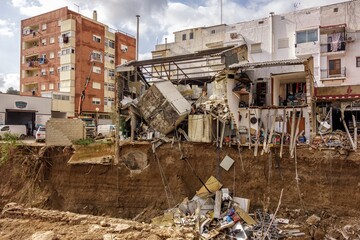 Buildings half destroyed by the flood in the Poyo ravine caused by the intense rains of the Dana...