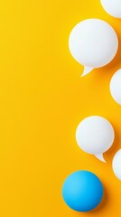 A minimalist design with white and blue speech bubbles floating on a bright yellow background, symbolizing vibrant communication.