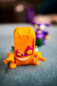 Closeup shot of the game Superthings Rivals of Kaboom orange toy figurine