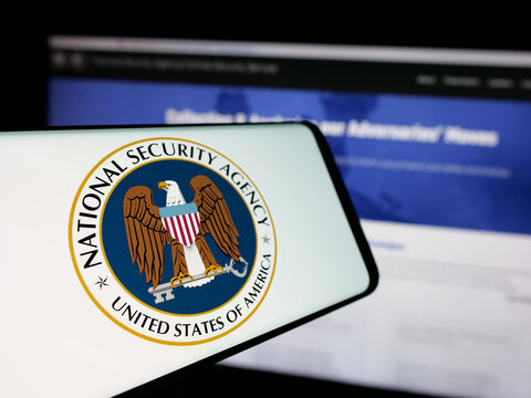 Stuttgart, Germany - 10-28-2024: Smartphone with logo of National Security Agency (NSA) on screen in front of website. Focus on center-left of phone display.