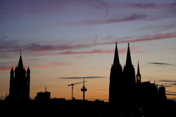 Naklejka premium Silhouette of a Cologne Church in the afternoon