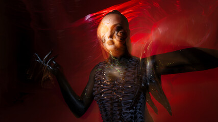 Snake woman, stylish and daring woman, snake pattern makeup, bright photo on a red background,...