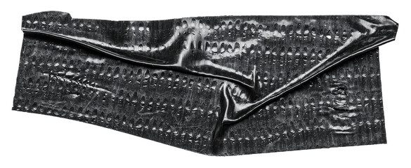 Isolated cut out wrinkled torn adhesive black tape sticker piece or label with texture copy space...