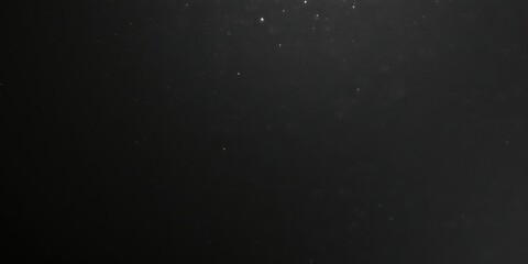 Obraz premium Shiny silver glitter on elegant black background, texture