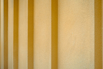 Rough orange wall background with cement