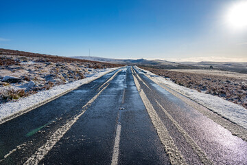 Desolate icy road to Princetoen Dartmoor