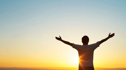 Fototapeta premium Man embraces freedom at sunset, arms raised in golden light, surrounded by serene nature, evoking success, peace, and joy. Mindful and grateful, he finds solace in the beauty of the moment