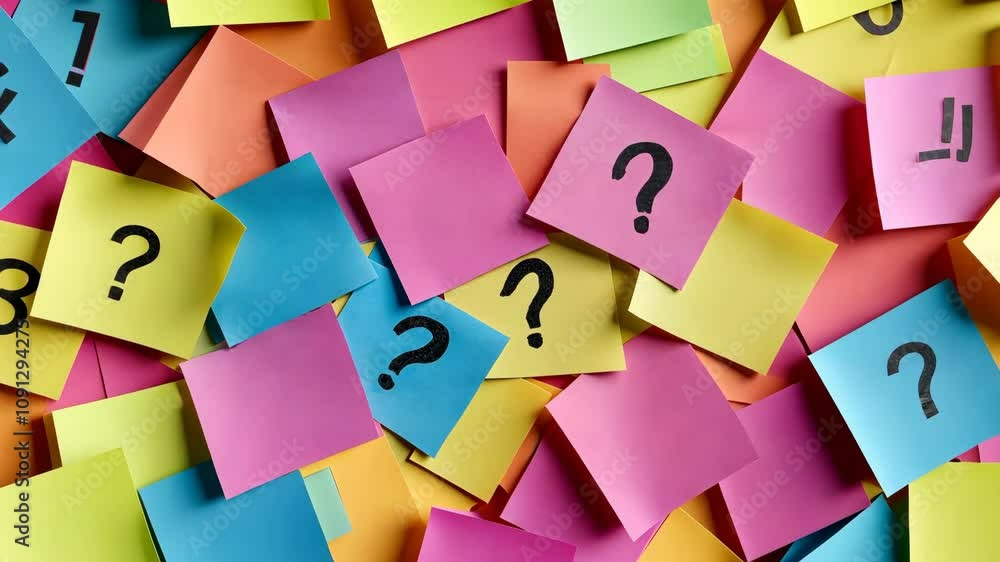 Poster a bunch of colorful sticky notes with a black question mark on them. the notes are scattered all ove
