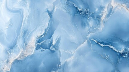 Obraz premium Luxurious blue marble texture with soft, flowing patterns and a polished appearance, perfect for elegant backdrops and design elements.