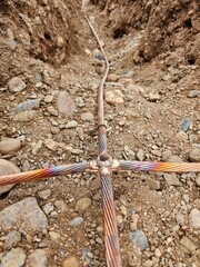 The connection of a large copper conductor as part of the electrical system of the underground...