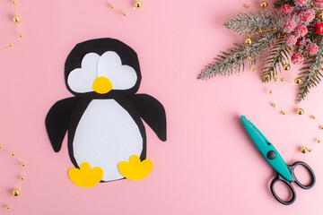DIY. Step-by-step instructions for making a penguin out of paper. Flat lay, top view. Step 6