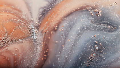 Fototapeta premium Sparkling fluid. Liquid ink color mix. Blurred orange grey color shiny dust particles acrylic paint swirl water emulsion flow abstract art background.