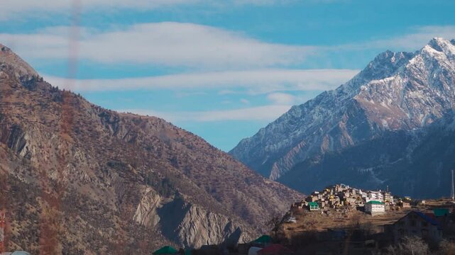 Triloknath village under the snowy Himalayan mountain peak at Lahaul and Spiti district in Himachal Pradesh, India. Beautiful village under the snowy Himalayan mountain peaks during the winter season.