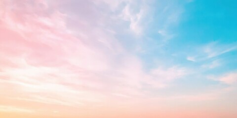Obraz premium A serene sunset sky blending pastel hues of pink and blue, evoking tranquility and peace.