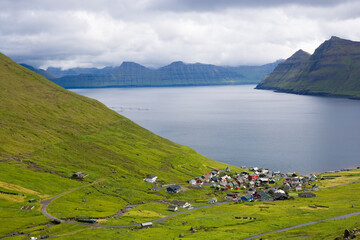 View of Funningur village and Funningsfjørður - one of the deepest fjords in the Faroe Islands