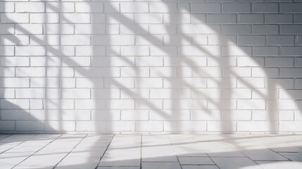Obraz premium Brightly lit white brick wall texture featuring soft shadows, creating a spacious and inviting panoramic background ideal for various design purposes.