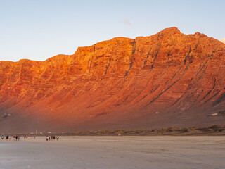 Stunning Red Light on the Rocky Cliffs of Famara Beach, Lanzarote