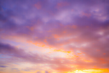 Obraz premium Soft pink sky background,Background of blurred pink sky and clouds in soft sweet tone,Abstract blurred sunset sky and clouds background with glowing flare light.