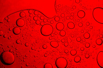 Red macro drink foam texture,Abstract red looking oil and water bubbles of various sizes,Nature...