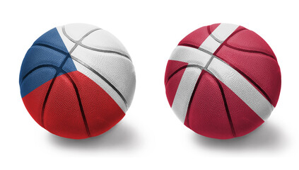 basketball balls with the national flags of denmark and czech republic on the white background.