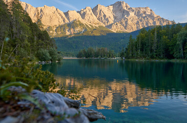 Scenic View of Eibsee Lake with Zugspitze Mountain at Sunset in Bavaria, Germany. Stunning Eibsee Lake with Zugspitze Reflection at Sunset in Bavaria, Germany. Tranquil Alpine Scene Captures the