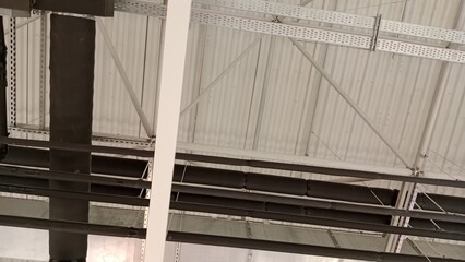 Obraz premium Ventilation pipes and propellers on the ceiling.