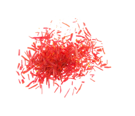 Red saffron pile of condiment isolated on white