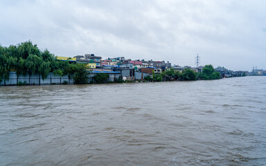  Bagmati River flooded and affected the riverbanks and homes during heavy rainfall in Kathmandu,...