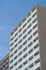 Modern apartment building facade urban setting architectural photography daytime high angle contemporary design