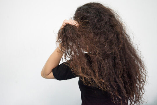 woman with long hair and damaged hair problems