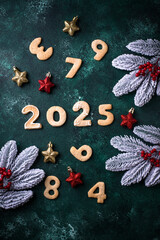Festive New Year cookies in shape of 2025