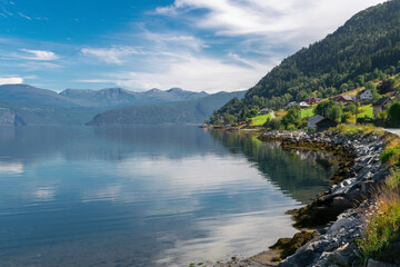 Utvik is a village in Stryn Municipality in Vestland county, Norway. The village is located on the southern shore of the Nordfjorden.