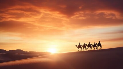 Obraz premium Silhouette of Camels at Fiery Sunset