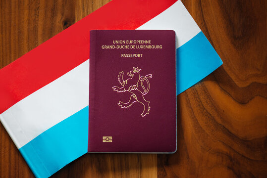 Passport of Grand Duchy of Luxembourg on the Luxembourg flags background, copy space
