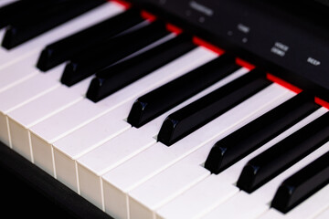 Closeup of black and white piano keyboard