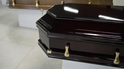 The coffin of the permium in the field office, close-up. The concept of death, war, old age.