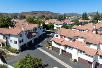 Fototapeta premium Aerial view of residential subdivision condominium house neighborhood in Mission Mesa. South California, USA