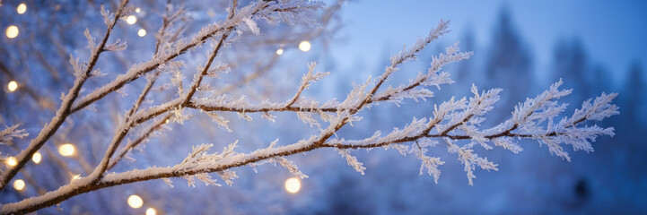 Obraz premium Frosted branches adorned with twinkling lights, softly blurred in the background, creating a magical winter scene with bokeh lights and snowflakes