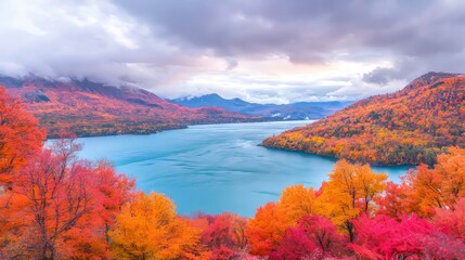 Fototapeta premium Vibrant autumn landscape with colorful trees surrounding a serene lake.