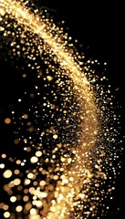 Fototapeta premium a golden trail rushes along the black background, leaving countless golden glows from golden particles