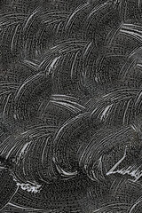 Background, texture of the black surface of a metal car door in white soapy foam after washing....