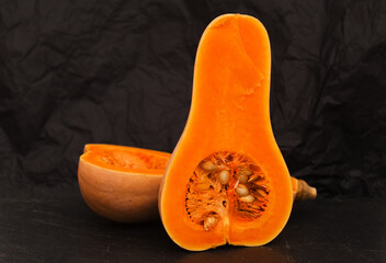 small pale orange ripe butternut squash, a type of winter squash 