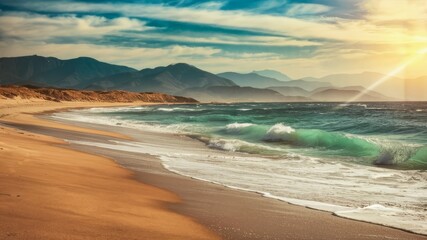 Ocean's Embrace: Capture the vibrant turquoise waters gently lapping the golden sands. Mountains frame the horizon. Witness nature's grandeur!