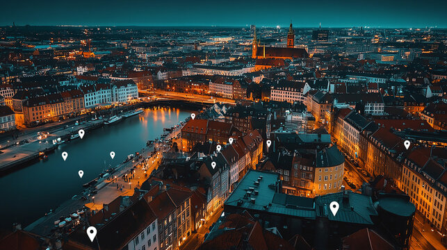 Aerial view of the Copenhagen skyline at night, with white pins on it representing buildings and shops that can be tiled to form a map for digital marketing, location pin icons floating
