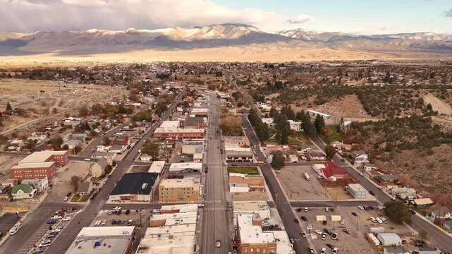 The main street of Ely, Nevada, along US Route 50, the loneliest road in the USA. Early season mountain snow