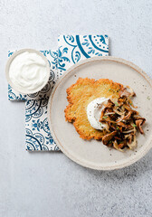 Potato pancake with chanterelle mushrooms