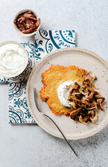 Potato pancake with chanterelle mushrooms